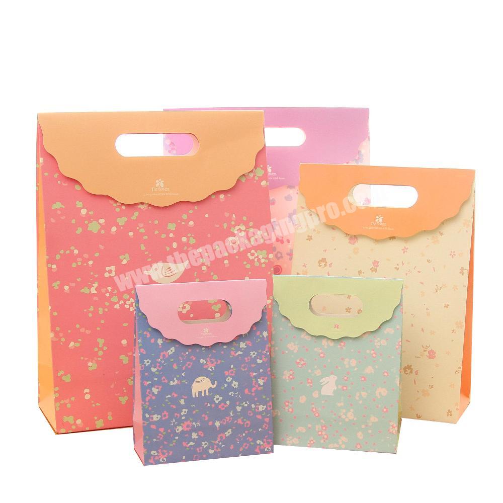 Factory Price Customized handmade clothing packaging storage paper gift bag
