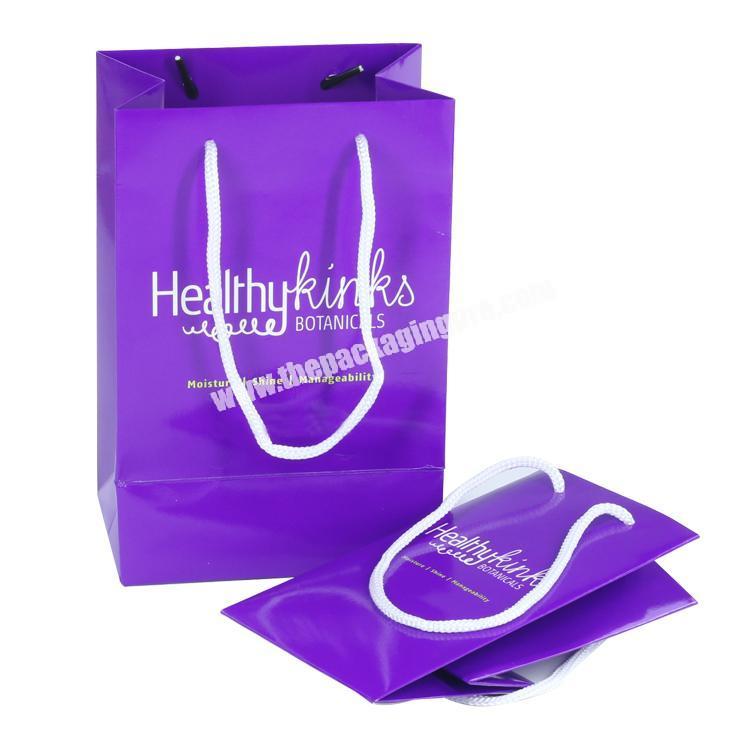 New custom logo shopping packaging 210gsm packing resealable purple paper hand bag for gift