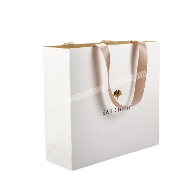 Wholesale Personalized Gold Foil Logo Luxury Tote Fancy Paper Gift Packaging Shopping Bag