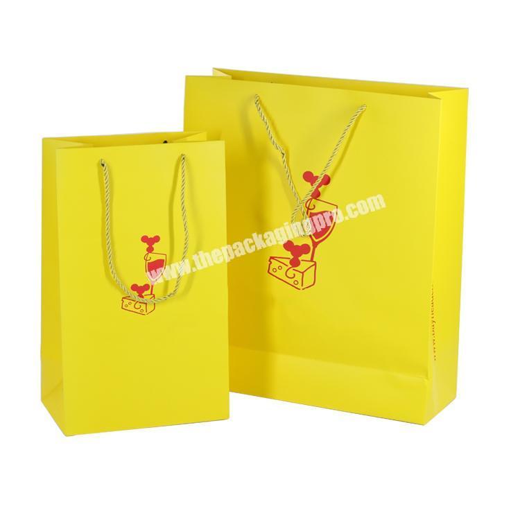 2019 New coated paper packaging , yellow custom size paper wine bag for packing