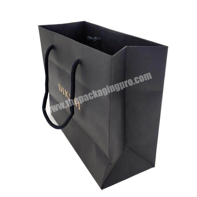 2020 New Design Most Popular Christmas Theme Logo Printed Black Handle Hard Cardboard Paper Gift Bag for Christmas Gifts