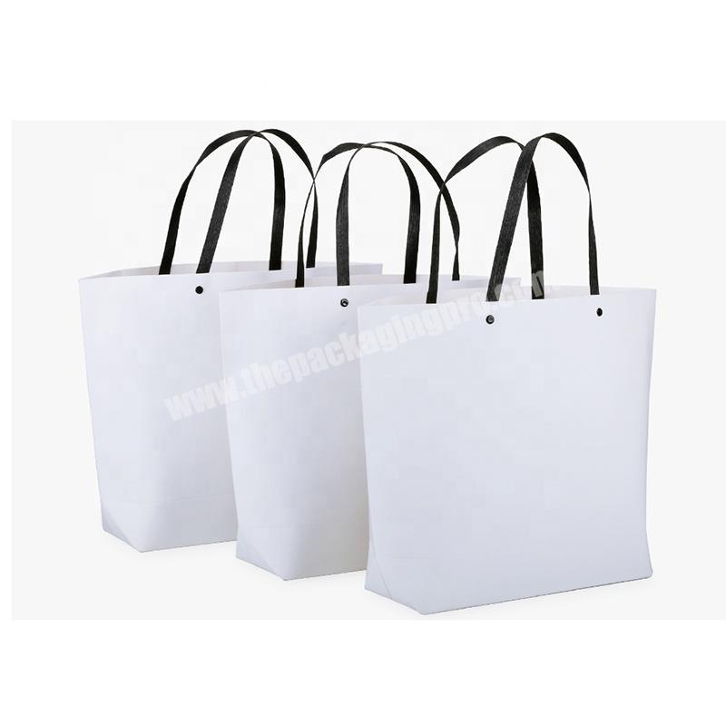 2020 New Design Simple And Fashion Style Hot Selling Custom Logo Recycle Paper Gift Packaging Bag With Logo Printing