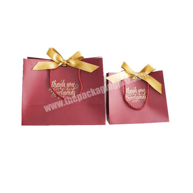 Manufacture red color paper bag Professional Hot stamping gold foil logo paper bags thank you paper gift bags with butterfly
