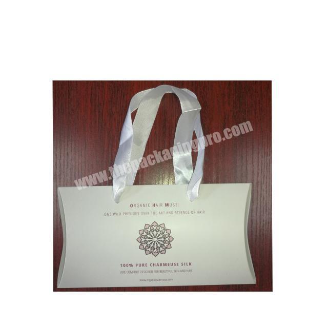 Wholesale custom flat folding pillow gift box with ribbon handle