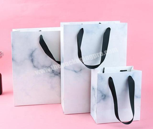 Wholesale elegant marble design printing gift packaging paper bag for jewelry