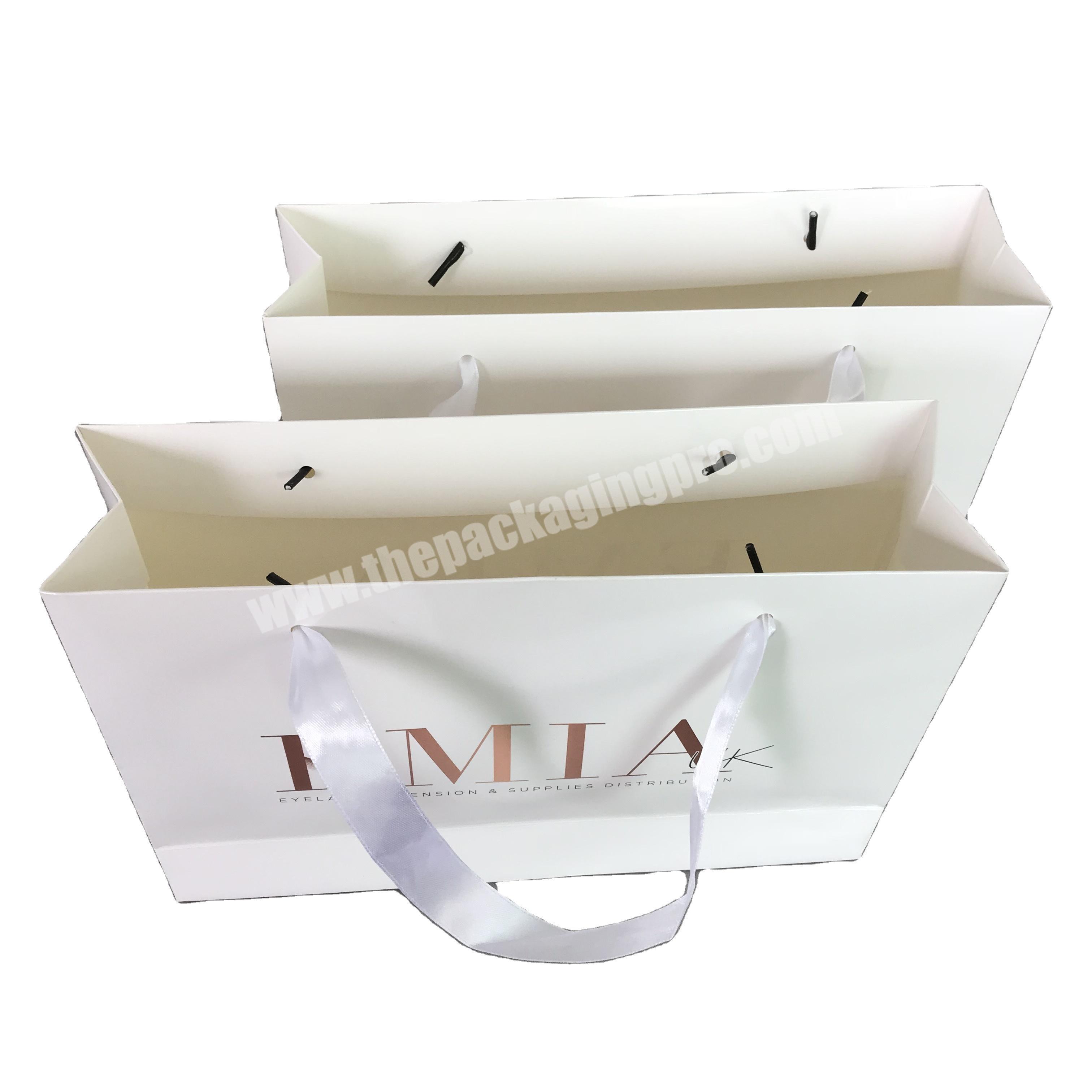 China factory latest custom design printed paper bags for retail shopping