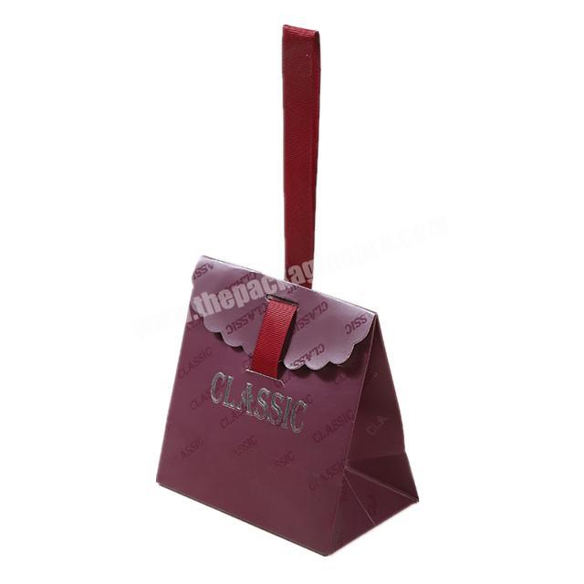 Latest  Pretty Sliver Logo Hot Foiled Stamping Print Wine Red Paper Bag With Ribbon Handles