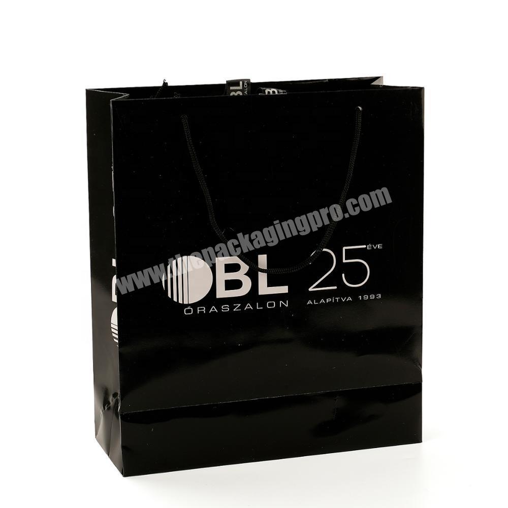 Luxury Silver Stamping strong handle texture paper glossy black print gold foil paper bag with logo