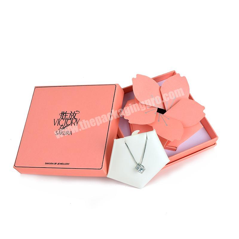 Pink cardboard box packaging jewelry with custom logo