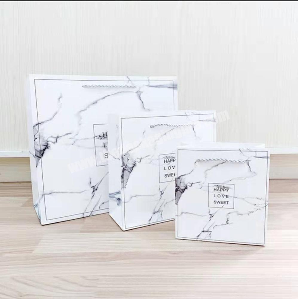Wholesale custom unique  marble paper bag for garments packaging shopping paper bag with handles
