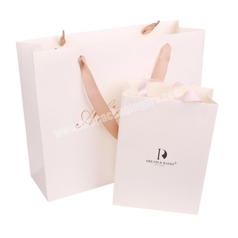 2019 Factory price eco-friendly white shopping kraft paper bag with your own logo