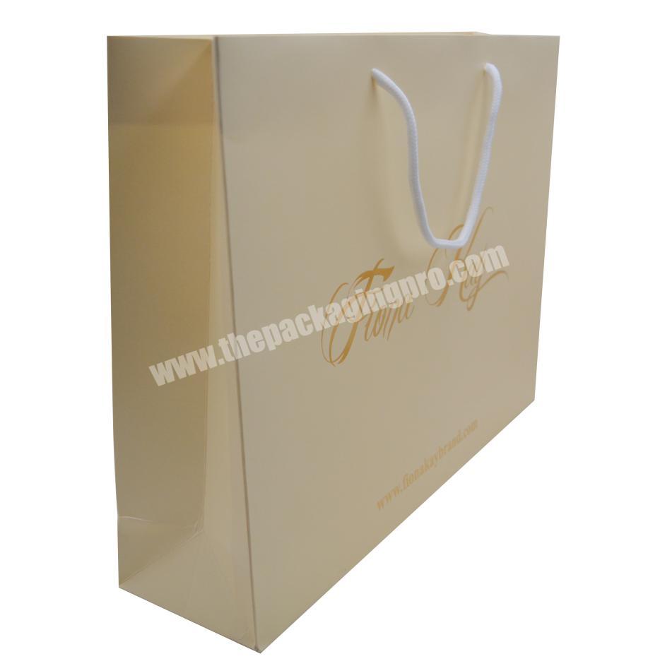wholesale Custom gold foiling gift bags paper shopping bag