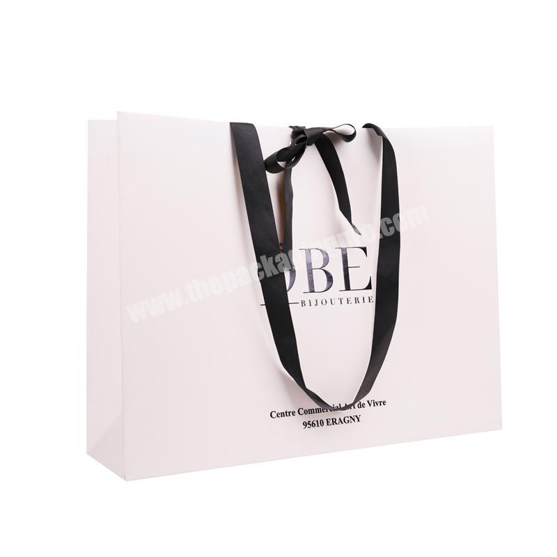 High quality white paper bag with black logo black ribbon
