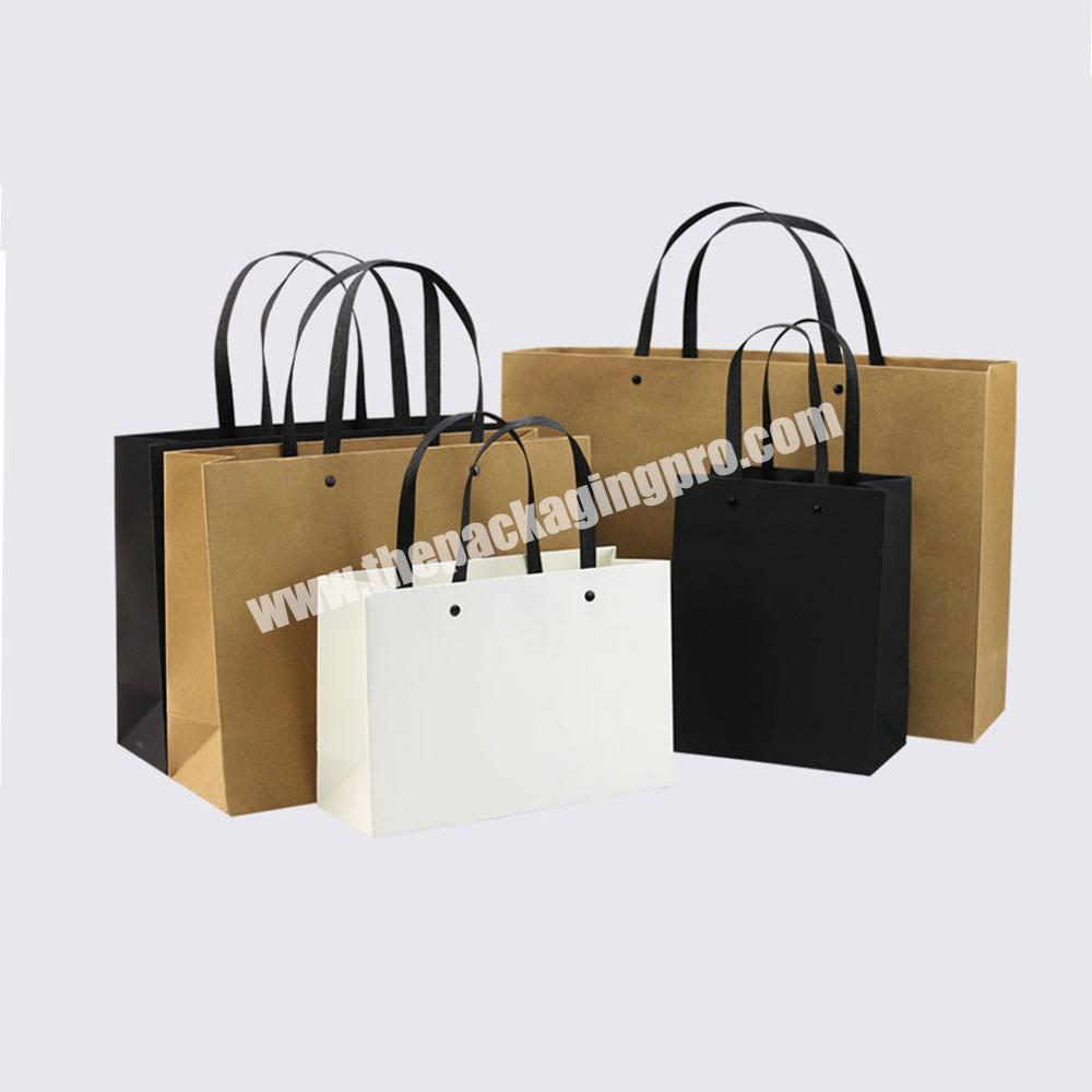 Wholesale cheap large luxury carrier packaging custom logo gift shopping paper bag for jeans