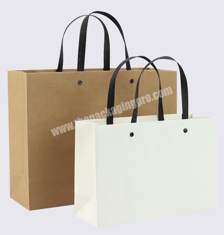 Manufacture new design plain cheap customized brown gift kraft paper carry bags with eyelet hole handles for shopping