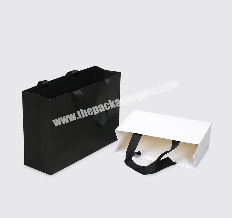 Luxury black gift bag wholesale custom recycledkraft paper bag merchandise bags