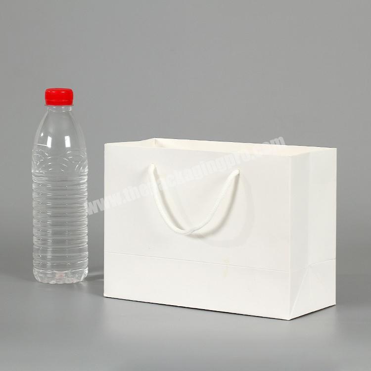 Wholesale high quality Shopping Blank Logo Take Away White Gift Paper Bag Beautiful bag