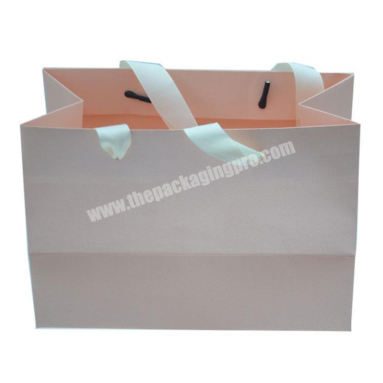 wholesale customized paper bag Light Pink Merchandise Gift Paper Bag with high quality