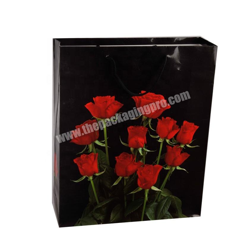 Wholesale Luxury Red Rose Printed Eco-friendly Black Paper Gift Bags With Handles