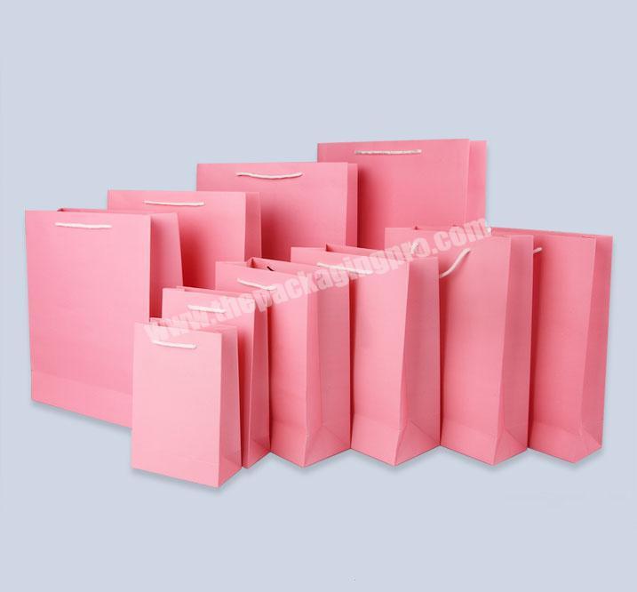 Standard size matte pink gift paper bag cosmetic paper bag with ribbon and logo printing