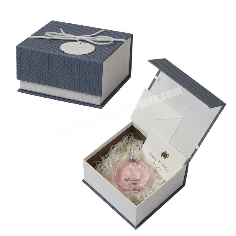 Custom logo luxury book shaped cardboard perfume packaging box