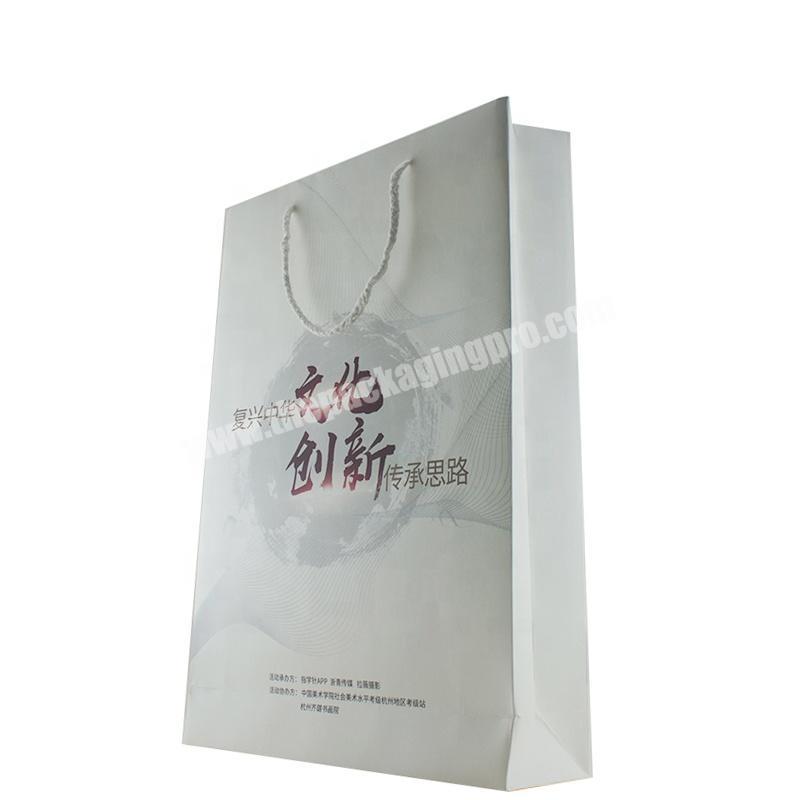 China Suppliers Custom White Shopping Bags Logo Design Packaging Printing Paper Bag
