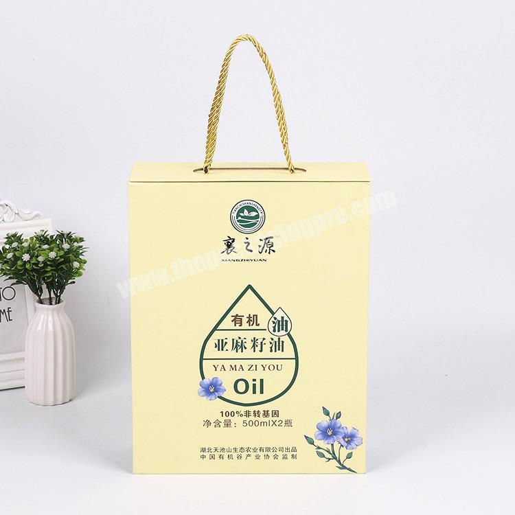 Custom Design Logo Printing Cardboard Paper Packaging Box For Linseed Oil With Handle