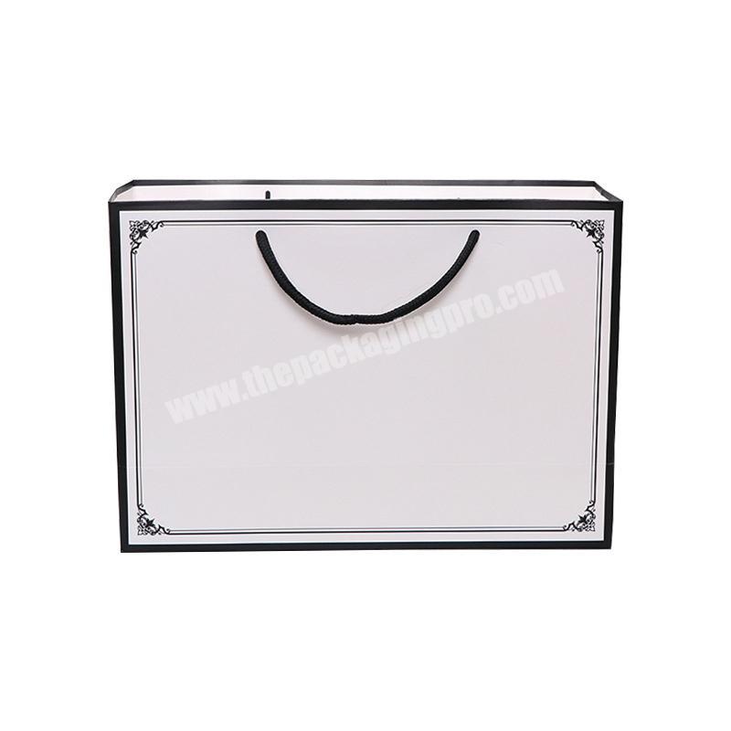 Wholesale custom logo white clothing  paper bag supplier