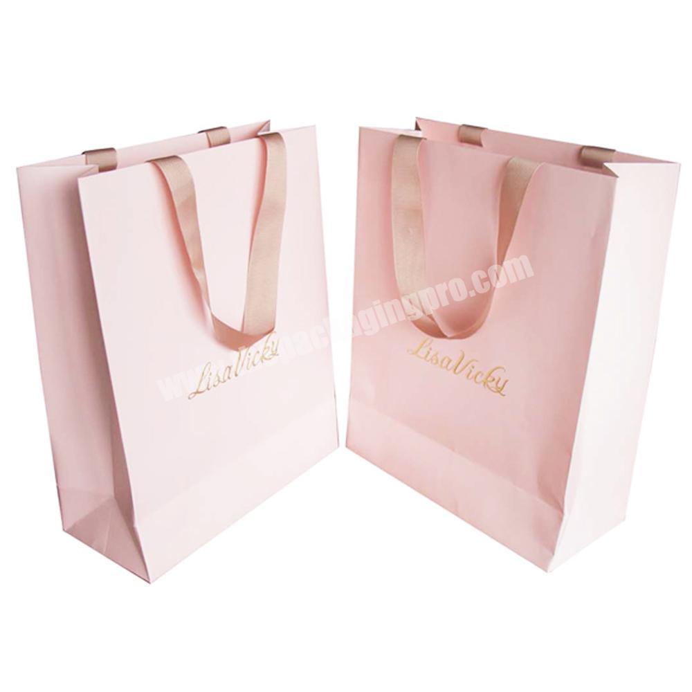 with you logo custom garment paper packing bag from shenzhen