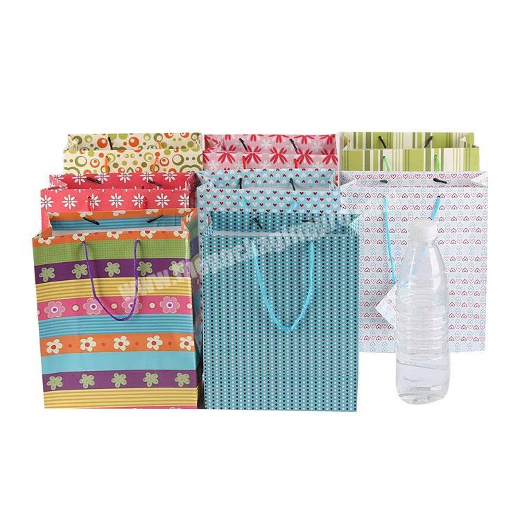 Assorted customised  Parties, Birthday, Wedding and Christmas Medium Colorful Paper Gift Bags handle