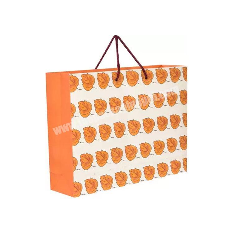Cheap gift carry customised biodegradable clothing packaging paper shopping bag with logo