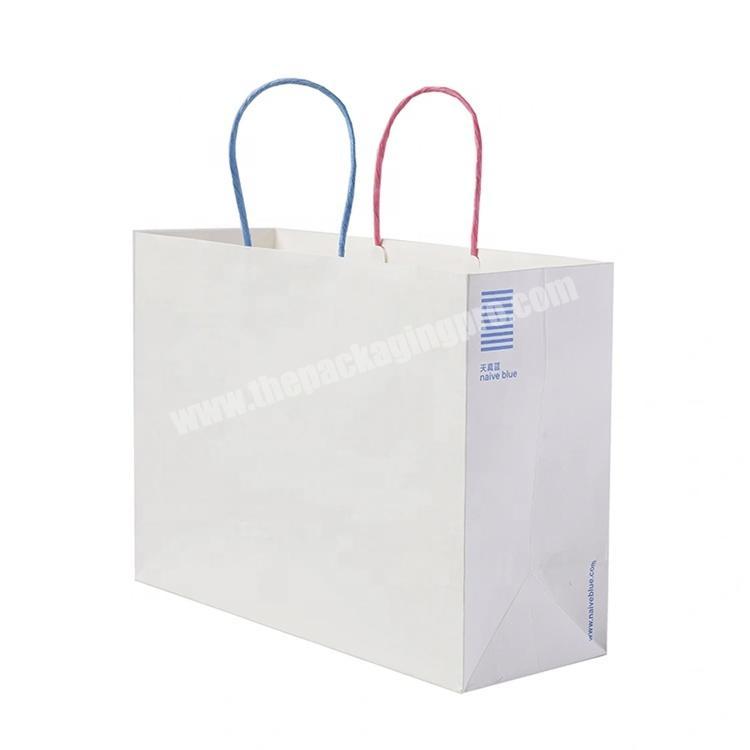 China Manufacturer Craft Paper Shopping  Bag with Custom Logo