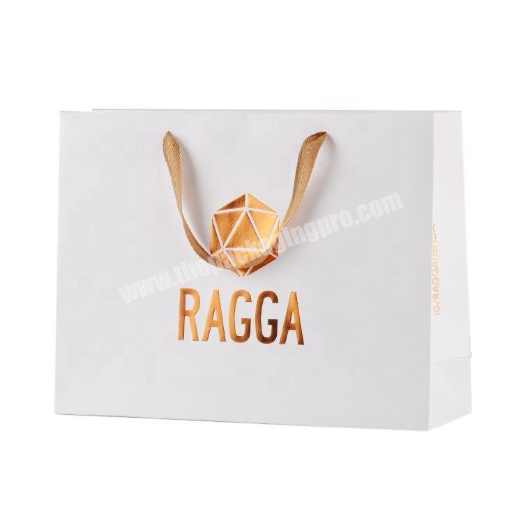 Custom design paper white card paper packaging shopping paper bags for clothing
