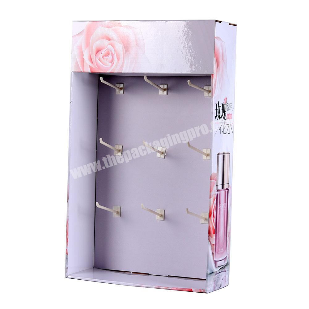 Custom design small plastic hook cardboard skin care product display stand cosmetic for supermarket
