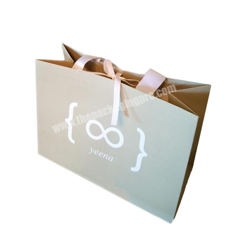 Customized ribbon handle boutique paper gift package paper bag