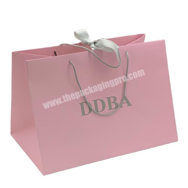 High quality custom luxury fancy paper gift pink shopping paper bag with ribbon tie