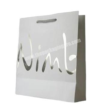 High quality custom shopping clothing paper bags with uv logo