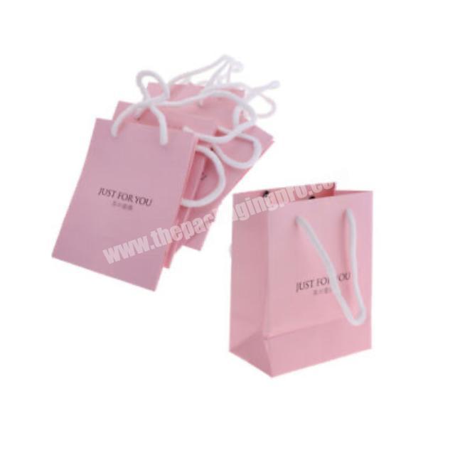 Hot selling cardboard pink shopping paper gift bags for makeups
