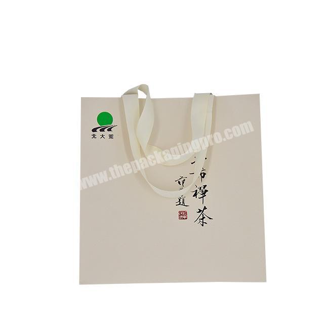 Hot selling custom luxury paper bag shopping packaging bag custom art paper bag