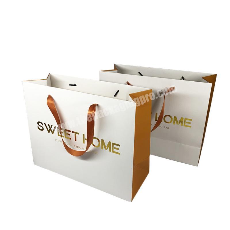 Hot selling shopping paper bag custom print shopping holographic paper printed logo paper bag custom with handle
