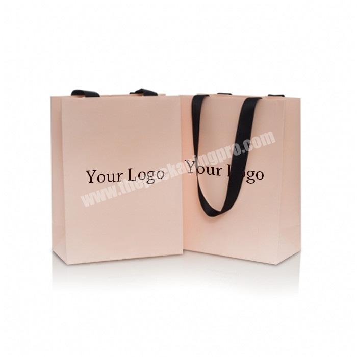 Luxury custom pink fancy paper kraft shopping paper bag with ribbon handle
