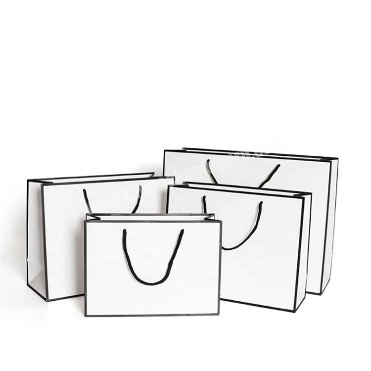 Luxury printed shopping paper bag for packing clothes