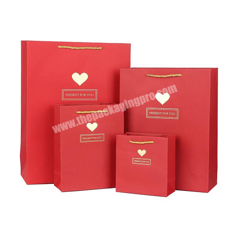 Promotional new style eco special day heart shaped party present deluxe shopping paper gift bags