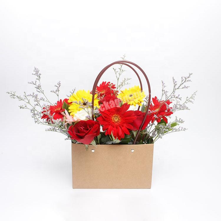 Rectangular flower kraft paper packaging bag with handle