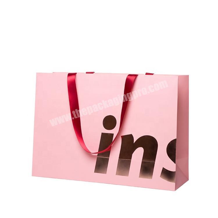 Retail pink gift shopping bag for cloth