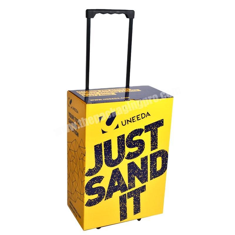 Trade show POP custom creative recyclable cardboard folding carrying trolley box with wheels and handle
