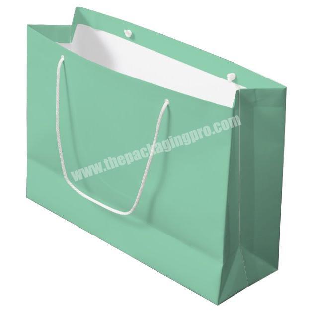Wholesale Custom Logo Cardboard Gift Craft Shopping Paper Bag With Rope Handle
