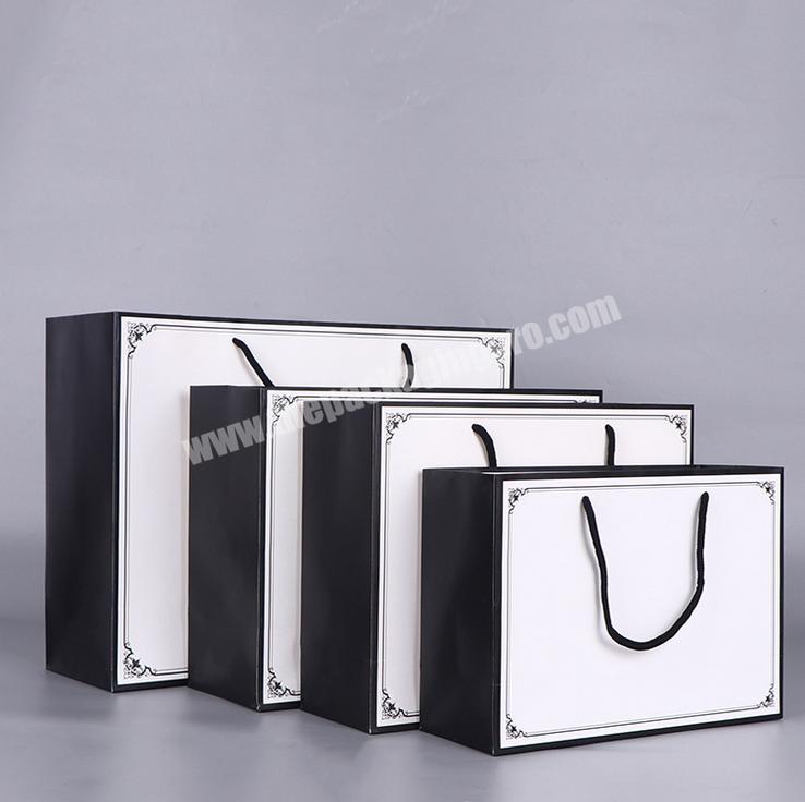 Wholesale Customized Personalized Logo Printed Gift Carrier White Paper Bags With Rope Handles