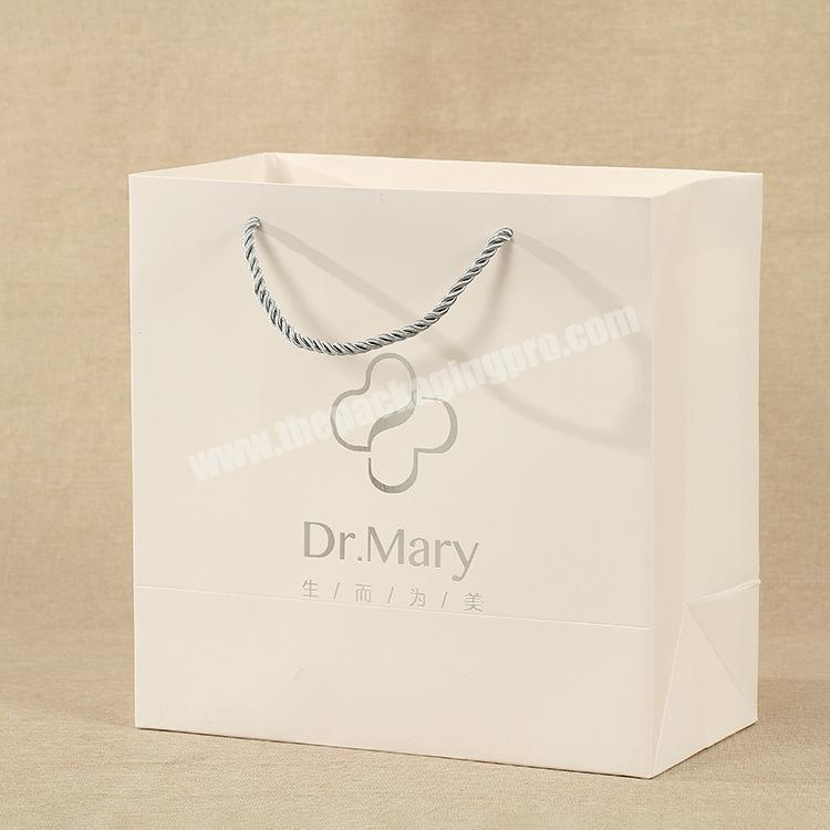 Wholesale Printed Packaging White Custom Brown Kraft Paper Shopping Gift Bag With Your Own Logo