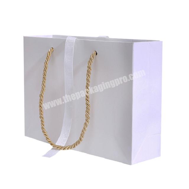 Wholesale custom printed luxury wedding gift paper bag with handle